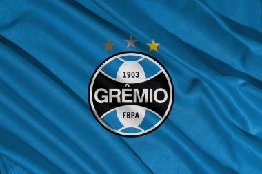 Pringsewu, Lampung Mayıs 08, 2025; Brezilya futbol kulübü Gremio logosu ve dalga dokusu arka planı. 3B illüstrasyon