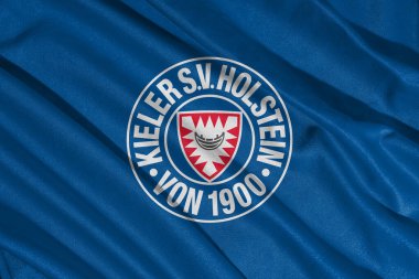 Pringsewu, Lampung 10 Mayıs 2025; Holstein Kiel futbol kulübünün ikinci Bundesliga 'daki bayrak logosunun arka planı. 3B illüstrasyon