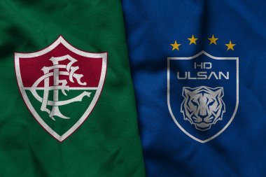Pringsewu, Lampung; 19 Haziran 2025; Fluminense futbol kulübü logosunun dokusu ve kulüpler arası dünya kupası yarışmasında Ulsan futbol kulübü logosu kombinasyonu.