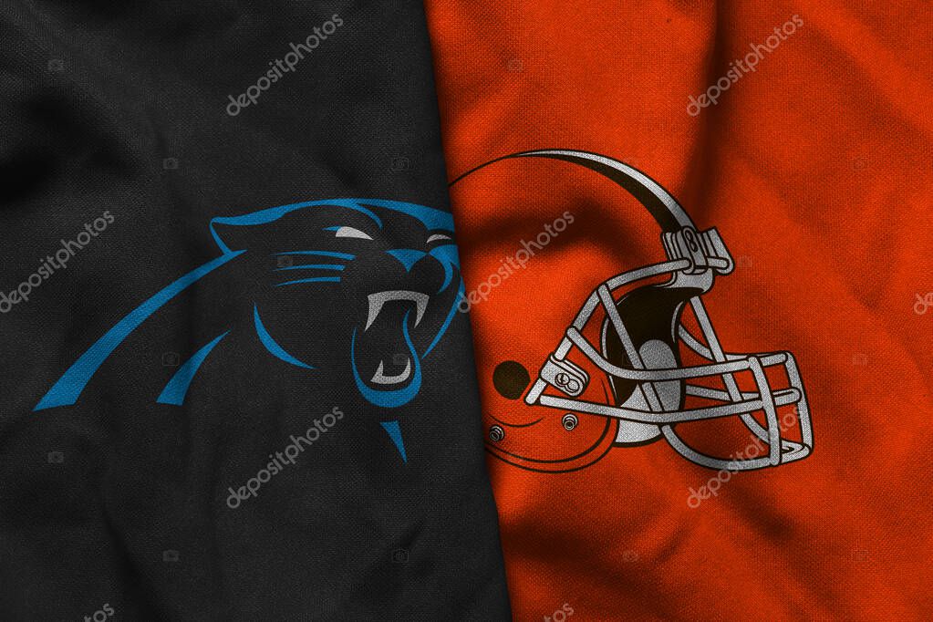 Pringsewu, Lampung; July 1, 2025; texture of the waving flag with the logo of the NFL American Football Team Carolina Panthers combined with the Cleveland Browns