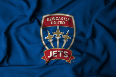 Pringsewu, Lampung; 12 Ağustos 2025; Sallanan bayrak Avustralya Profesyonel Ligi 'nde Newcastle Jets futbol takımının logosunu temsil etmektedir..