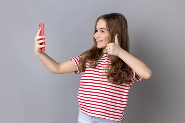 Portrait Little Girl Wearing Striped Shirt Making Video Call Using — Stock Photo, Image