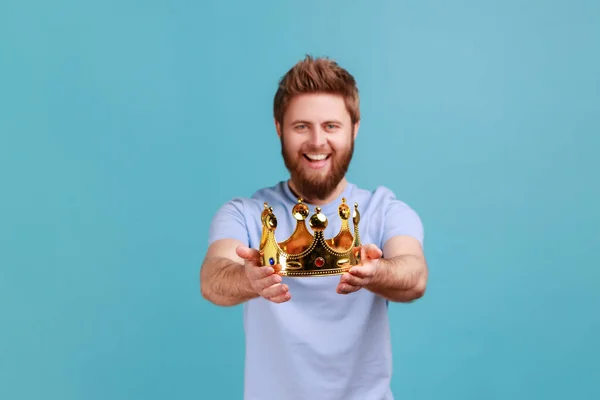Portrait Smiling Happy Bearded Man Holding Out Golden Crown Looking — Stock Photo, Image