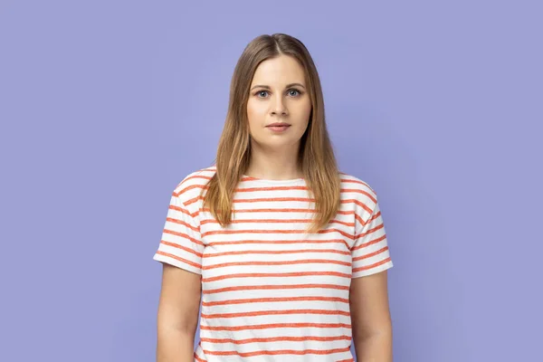 Portrait Serious Confident Blond Woman Wearing Striped Shirt Standing Looking — Stockfoto