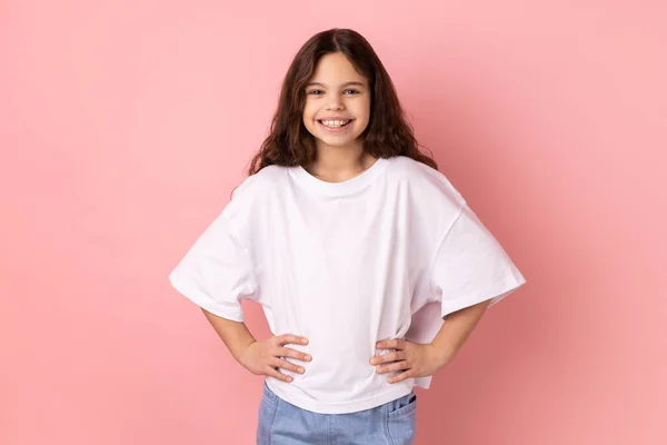 Portrait Delighted Smiling Little Girl Wearing White Shirt Standing Hands — Photo