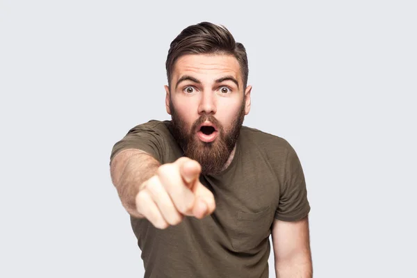 Surprised Wondered Bearded Man Wearing Dark Green Shirt Pointing Fingers — Stock Photo, Image