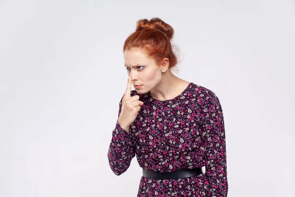 Portrait Ginger Woman Wearing Dress Pointing Nose Doing Lie Gesture — kuvapankkivalokuva