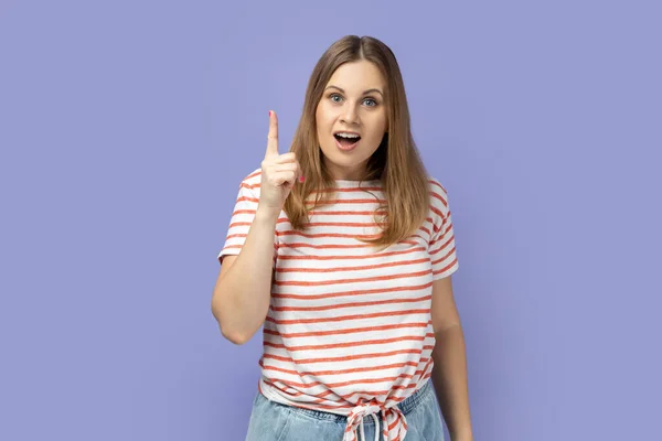Portrait Inspired Blond Woman Wearing Striped Shirt Pointing Finger Looking — Stock Photo, Image
