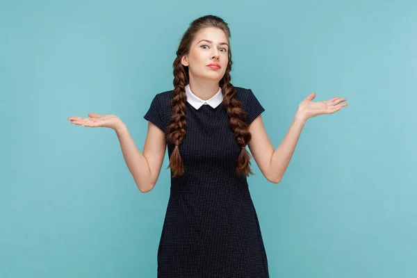 Puzzled Uncertain Young Woman Braids Spreads Hands Aside Shrugging Shoulders — Stock Photo, Image