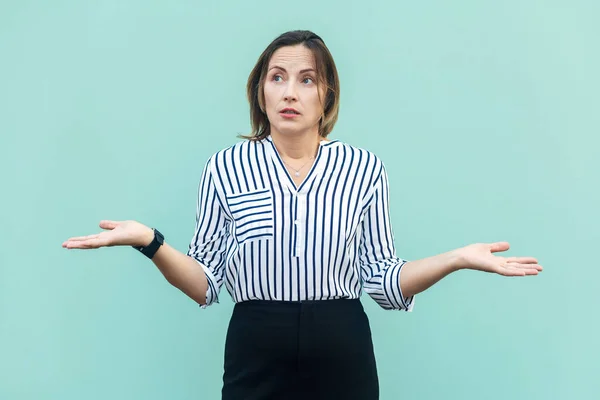 Portrait Ambiguous Confused Middle Aged Woman Wearing Striped Shirt Spreads — Stock Photo, Image