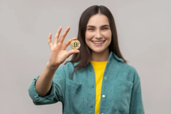 Portrait Smiling Optimistic Woman Dark Hair Holding Gold Bitcoin Looking — Stock Photo, Image
