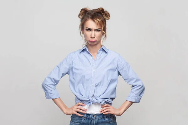 Portrait Blonde Woman Keeping Hands Hips Has Unhappy Look Expressing — Stock Photo, Image