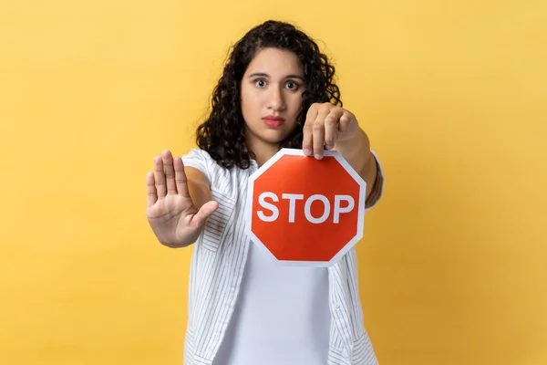 Portrait Strict Woman Dark Wavy Hair Holding Red Stop Sign — Stock Photo, Image