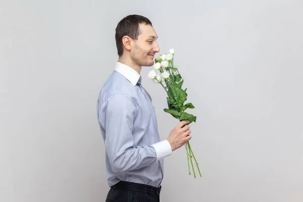 Side View Portrait Smiling Happy Attractive Man Standing Bouquet Smelling — Stock Photo, Image