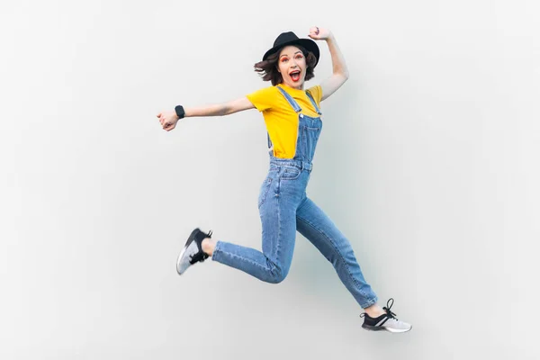 Portrait Excited Positive Hipster Woman Blue Denim Overalls Yellow Shirt — Stock Photo, Image