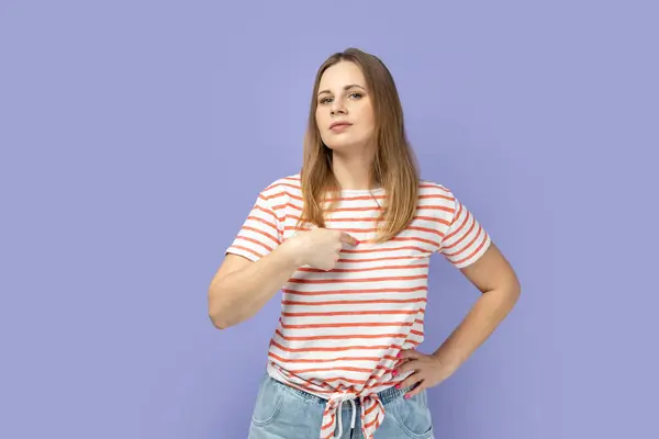 Arrogant Selfish Blond Woman Striped Shirt Proudly Pointing Herself Boasting — Stock Photo, Image