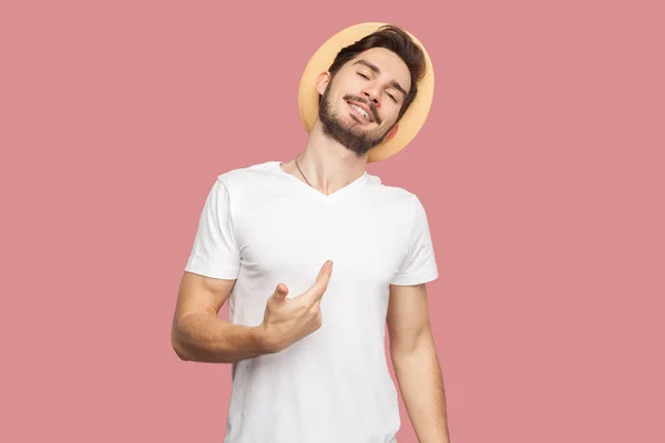 Portrait Satisfied Proud Bearded Man White Shirt Hat Standing Pointing — Stock Photo, Image