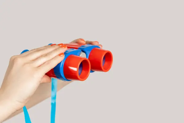 Closeup Woman Hand Showing Colorful Toy Binocular Vision Equipment Indoor — Stock Photo, Image