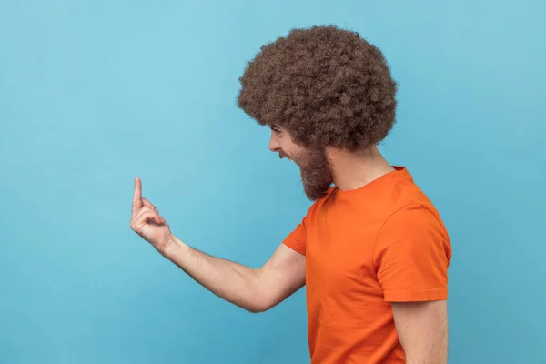 Side View Angry Man Afro Hairstyle Orange Shirt Showing Middle — Stock Photo, Image