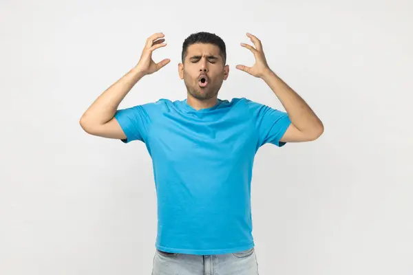 Portrait Shocked Tired Exhausted Unshaven Man Wearing Blue Shirt Standing — Stock Photo, Image
