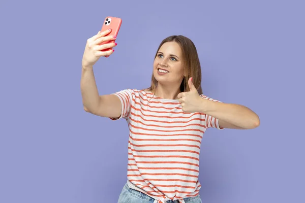 Portrait Joyful Blond Woman Wearing Striped Shirt Standing Cell Phone — Stock Photo, Image