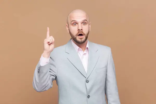Portrait Excited Bald Bearded Man Looking Away Raising Index Finger — Stock Photo, Image