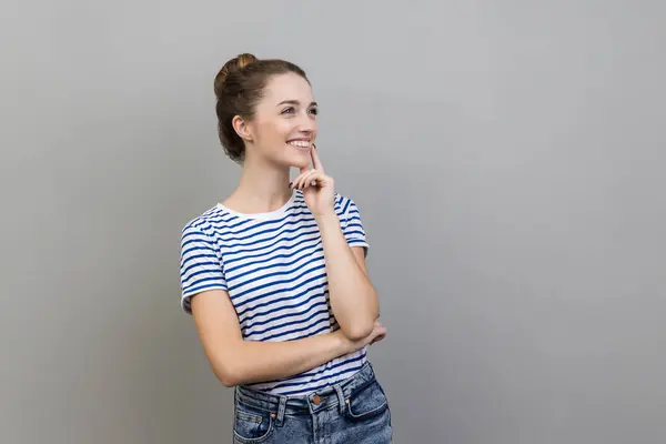 Portrait Smiling Woman Wearing Striped Shirt Standing Looking Away Keeping — Stock Photo, Image
