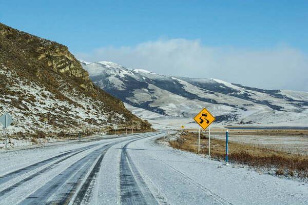 Snowy Road through the Patagonian Landscape near Ro Turbio, Argentina.