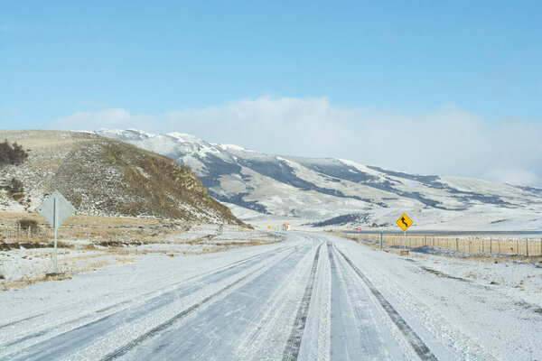 Snowy Road through the Patagonian Landscape near Ro Turbio, Argentina.