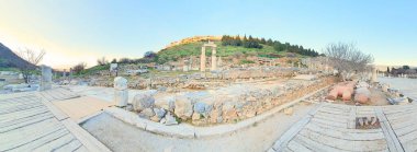 panoramic shot of the Ancient city ruins and historical structures found at the Ephesus Archaeological Site clipart