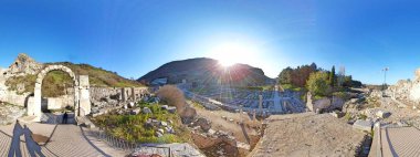 panoramic shot of the Ancient city ruins and historical structures found at the Ephesus Archaeological Site clipart