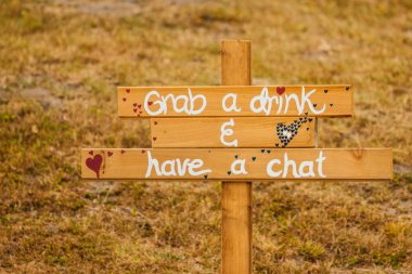 grab a drink, have a chat wooden sign board clipart