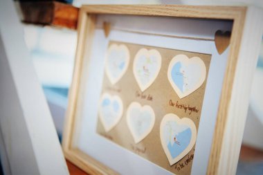 a framed picture of a heart with a map on it clipart