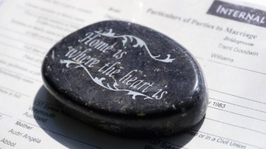 Pebble with the inscriptions in the form of a zodiac clipart