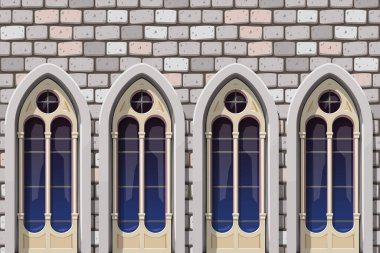 Kilisenin güzel pencereleri olan klasik taş duvardaki manzara.