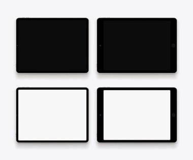 illustration of lying modern tablets on white backdrop with soft shadows in set front view