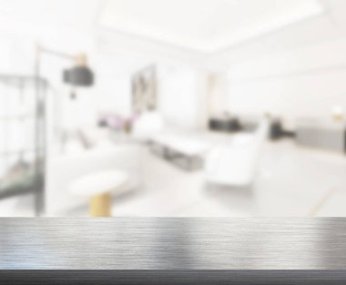 Masa üstü ve arka planın bulanık oturma odası