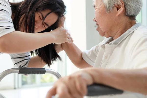 stock image Angry asian old elderly people with mood disorders,violent aggressive abnormal behavior,personality changes to violence,losing control over emotions,irritability,physical or mental health problems