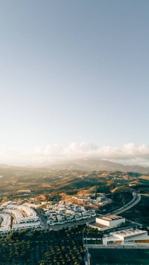 Gorgeous aerial view of La Cala de Mijas coastal area at sunset, highlighting beachside urban beauty. High quality photo clipart