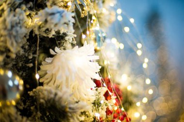 A lot of Christmas red balls with different textures. Background from Christmas decor. Typical decor for a Christmas tree.