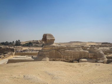 Giza 'nın büyük sfenksi, aslan gövdeli antik kireçtaşı anıtı ve Mısır' ın zengin tarihini sembolize eden Firavun 'un kafası.