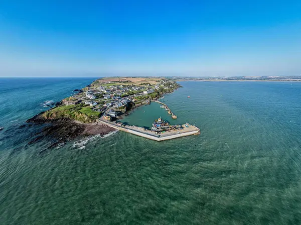 stock image Stunning aerial view of Ballycotton, Ireland on a bright, cloudless day  showcasing the rugged coastline and crystal clear waters of this picturesque seaside village