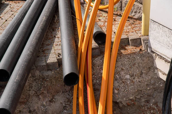 Organge Cables Lines Laid Street Construction Site City — Stock Photo, Image