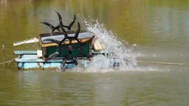 water turbine, oxygen turbine with a solar panel to generate power for treating wastewater in 4K, soft focus