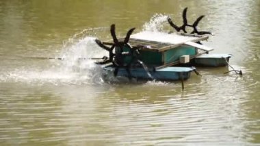 water turbine, oxygen turbine with a solar panel to generate power for treating wastewater in 4K, soft focus