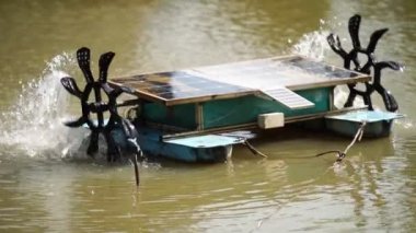 water turbine, oxygen turbine with a solar panel to generate power for treating wastewater in 4K, soft focus