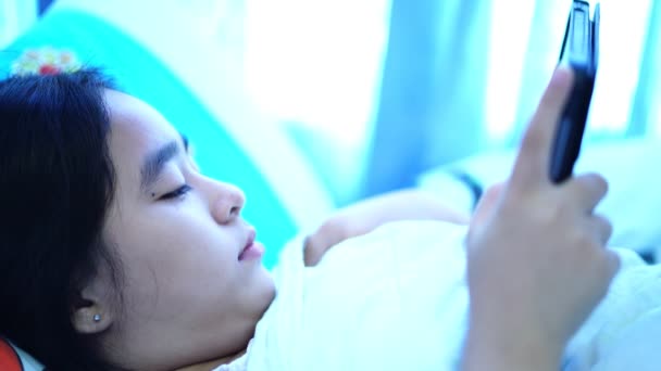 Women Using Mobile Phones Bed Girls Playing Tablets Bed Bedroom — Vídeos de Stock