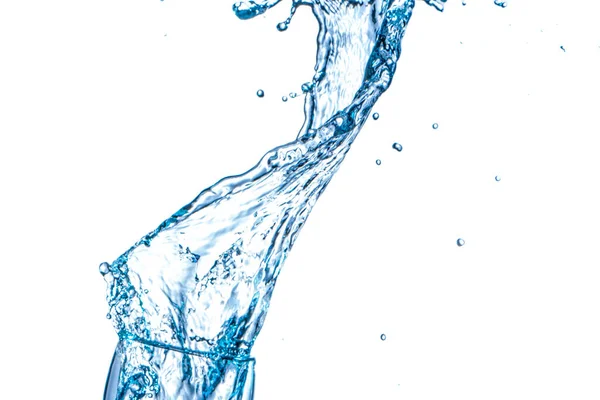 Trinkwasser Spritzt Aus Dem Glas Auf Weißem Hintergrund — Stockfoto