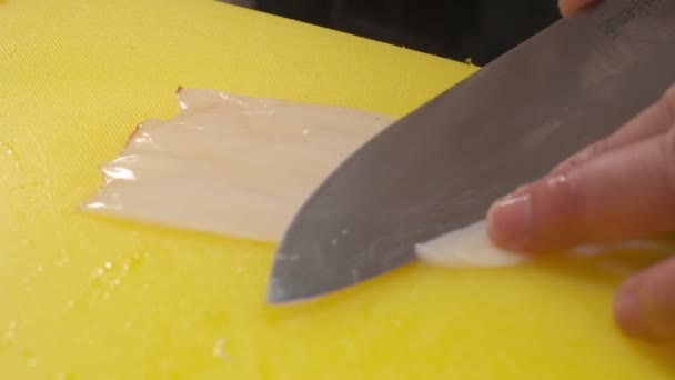 Chef Cuts Fish Slices Yellow Board Chefs Knife Closeup — Stock Video