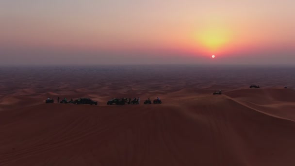 Drone Flies Atvs Standing Sand Dunes Desert Backdrop Sunset Aerial — Stock Video